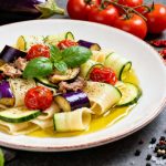 Calamarata con zucchine e melanzane: la ricetta estiva che conquista tutti